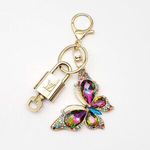100% Auth Louis Vuitton Lock & Key with unbranded Bagcharm, Keycharm, Keychain